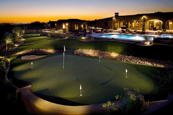 Southwest Greens of Michigan artificial golf green with sand trap at luxury home